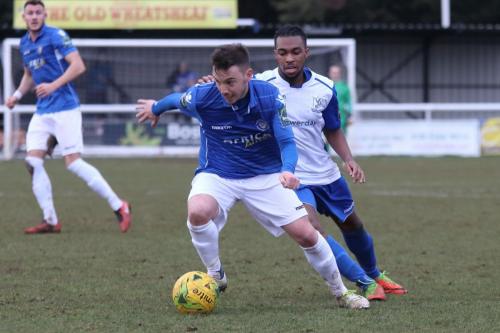 Lowestofts Adam Smith (blue) and Enfields Dernell Wynter