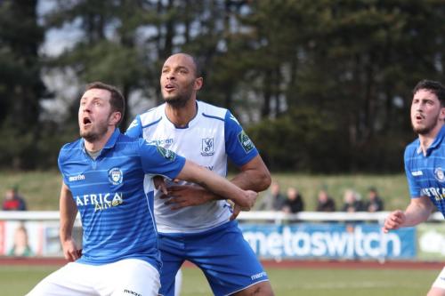 Lowestofts Jacek Zielonka (L) and Enfields Simon Thomas