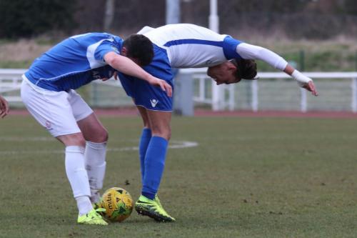 Lowestofts Travis Cole (L) and Enfields Sam Youngs