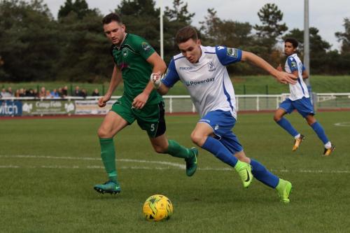 Enfields Ben Ward-Cochrane outpaces Danny Young (L)