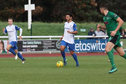Enfields Mario Noto (centre) and Mickey Parcell and Phoenix Sports Danny Young