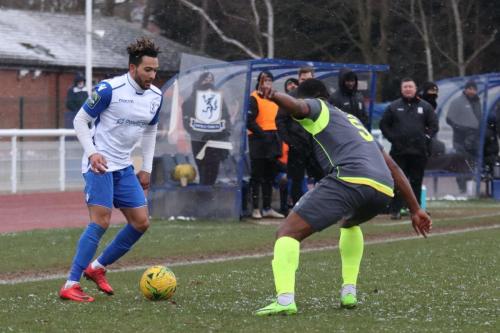 Enfields Tyler Campbell (L) and Staines Ugo Udoji