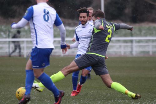 Staines Josh Webb and Enfields Jack Hockney (8) and Tyler Campbell
