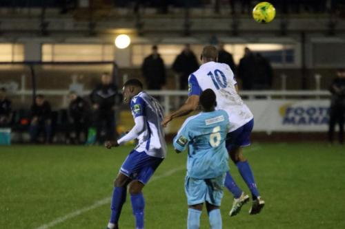 Enfields Ryan Blake (L) and Simon Thomas and Thurrocks Jeremiah Kamanzi