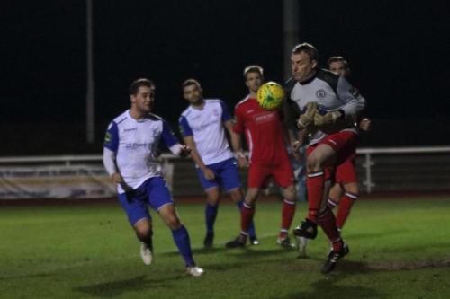 Chipstead keeper Tony Stone fumbles a cross