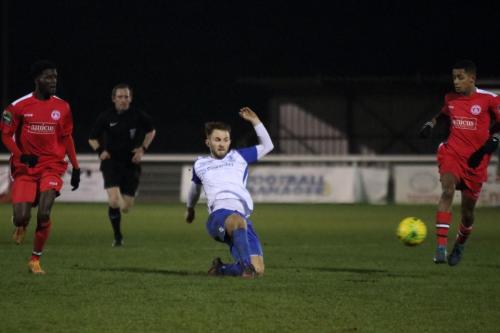 Chipsteads Jeremy Boakye (L) and Ollie Twum and Enfields Jack Hockney