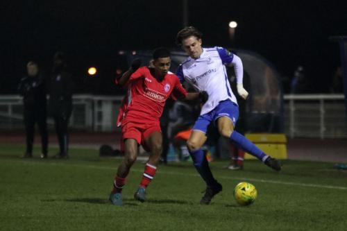 Chipsteads Ollie Twum (L) and Enfields Sam Youngs