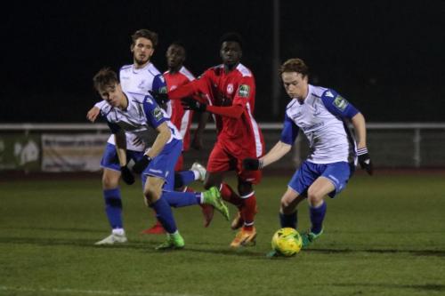 Enfields Aaron Greene runs at the defence