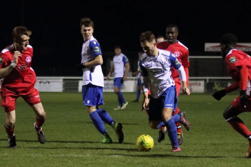 Enfields Jack Hockney runs at the defence