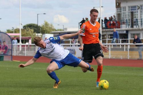 Enfields Aaron Greene (L) and Mets Lewis Putman
