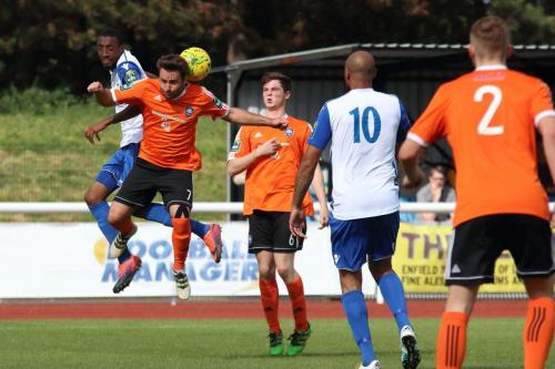 Enfields Ralston Gabriel (L) challenges Sam Hurrell