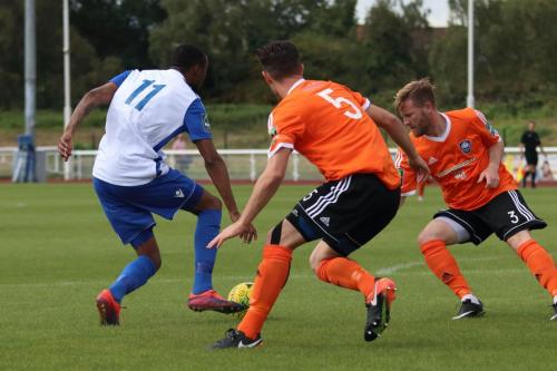 Enfields Ralston Gabriel cuts the ball back for Simon Thomas to open the scoring