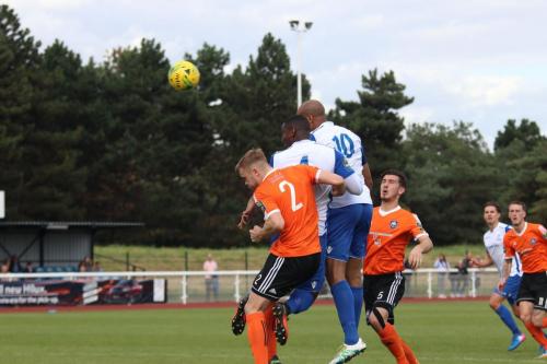 Enfields Simon Thomas (10) and Rob Bartley challenge Sam Williams (2)
