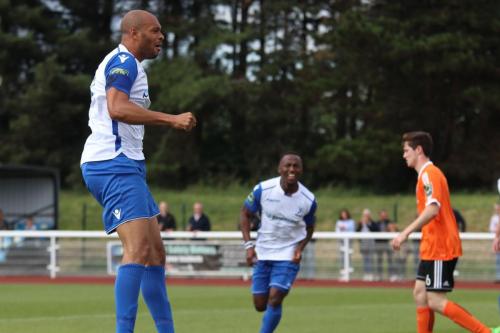 Enfields Simon Thomas (L) celebrates the opening goal