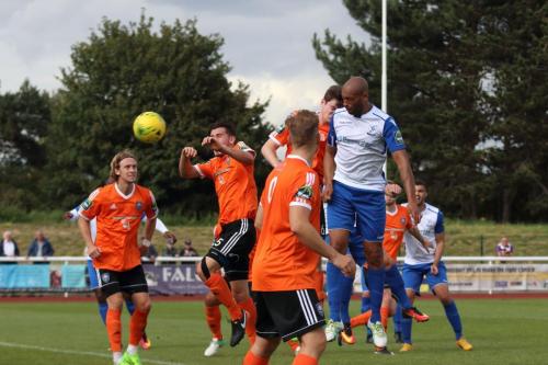 Enfields Simon Thomas (white) heads into the side netting
