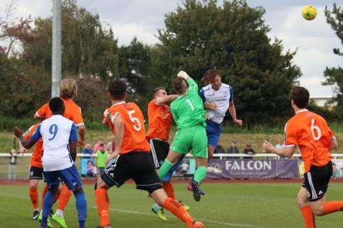 Met keeper Luke Williams punches clear