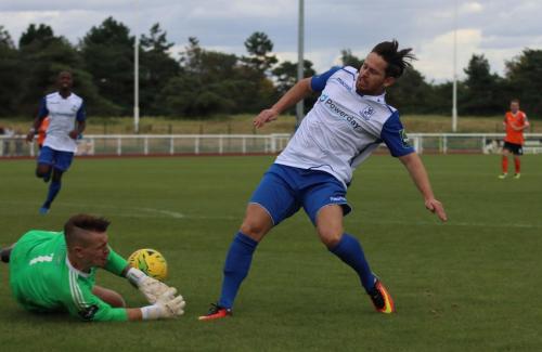 Met keeper Luke Williams saves at the feet of Drew Roberts