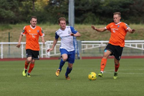 Mets Joshua Webb (L) and Charlie Collins and Enfields Aaron Greene