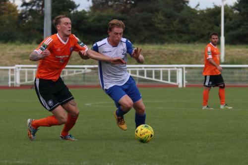 Mets Lewis Putman (L) and Enfields Aaron Greene159