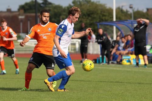 Mets Rylan Myers (L) and Enfields Aaron Greene161