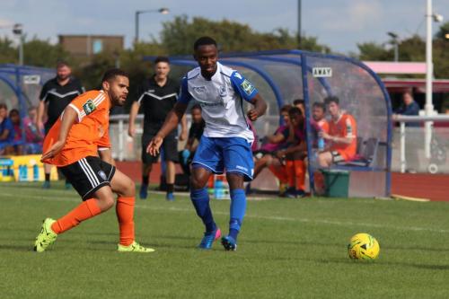 Mets Rylan Myers (L) and Enfields Ryan Blake