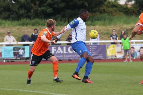 Mets Tom Bird (L) and Enfields Rob Bartley