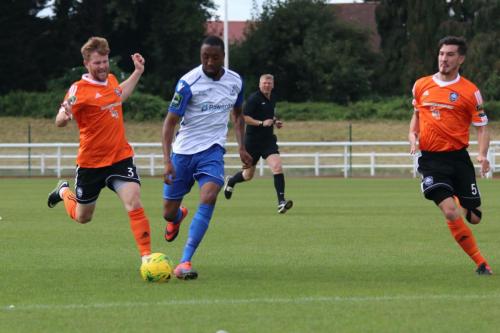 Mets Tom Bird (L) and Olli Robinson and Enfields Ralston Gabriel