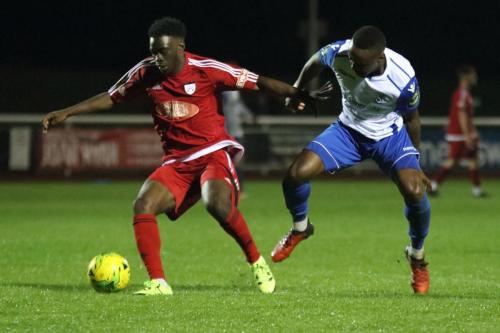 Hanwells David Sangola (L) and Enfields Ryan Blake