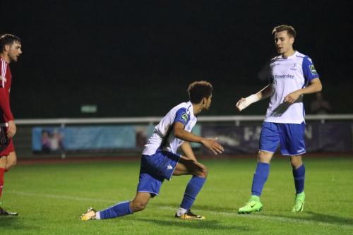 Montell Moore (centre) celebrates his goal with Ben Ward-Cochrane