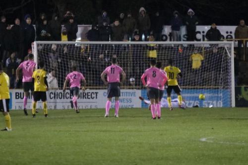 Enfields Joe Wright saves a penalty from Ade Yusuff (10)