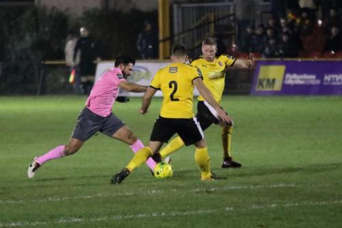 Enfields Mario Noto (L) and Invictas Josh Vincent (2) and Johan Ter Horst