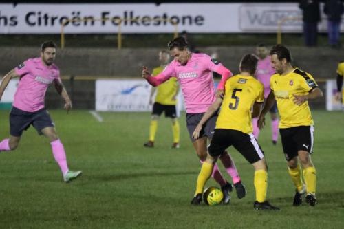 Enfields Sam Youngs (pink, R) and Steve Wales and Invictas Callum Davies (5) and Michael Everitt