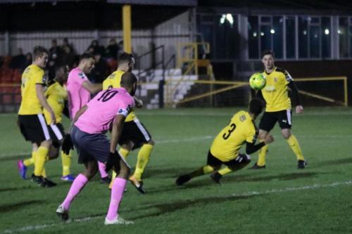 Invictas Nat Blanks blocks a shot from Taylor McKenzie