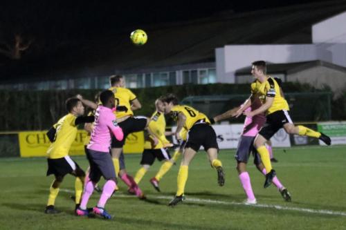 Simon Thomas (pink, R) gives Enfield an early lead