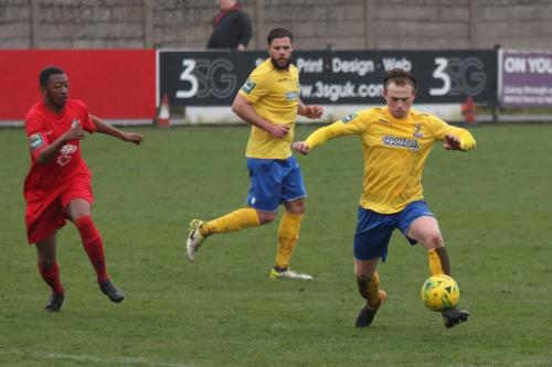 Enfields Aaron Greene (R) and Adam Martin and Harrows Charles Banya