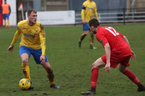 Enfields Brad Wadkins (L) and Harrows Mark McLeod