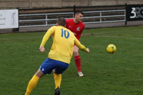 Enfields Brad Wadkins (yellow) and Harrows Adam Richards