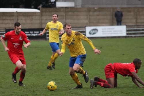 Enfields Brad Wadkins and Harrows Mark McLeod (L) and Chinua Cole