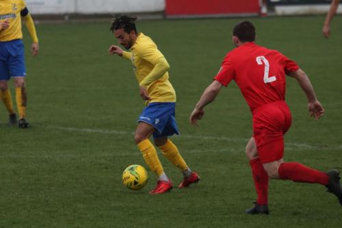 Enfields Tyler Campbell (yellow) and Harrows George Moore