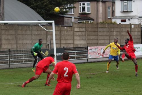 Harrows Adam Pepera (R) clears from Ryan Blake