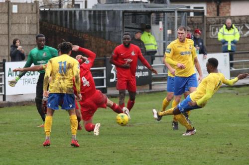 Harrows Adam Richards (4) blocks a shot from Ryan Blake