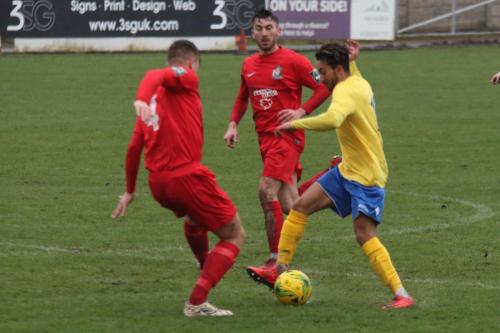 Harrows Adam Richards (L) and Lewis Cole and Enfields Tyler Campbell