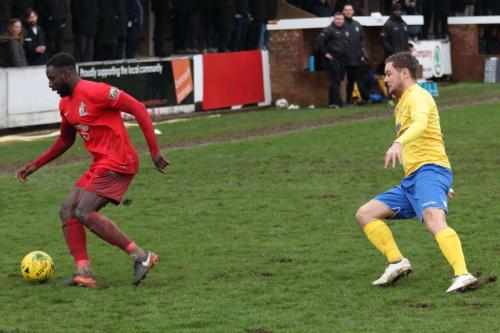 Harrows Charles Banya (L) and Enfields Liam Hope