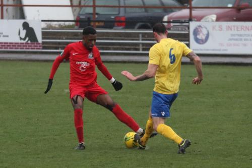 Harrows Kurtis Cumberbatch (L) and Enfields Matt Johnson