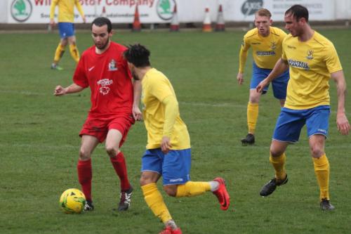 Harrows Michael Bryan (red) and (L-R) Enfields Tyler Campbell, Ryan Blackman and Matt Johnson