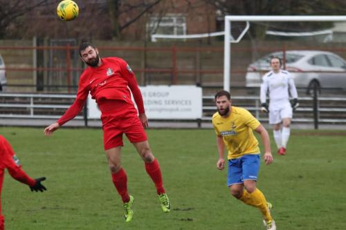 Harrows Ryan Moss (L) and Enfields Adam Martin