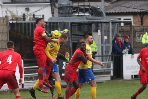 Harrows Shaun Preddie (2nd L) challenges Brad Wadkins