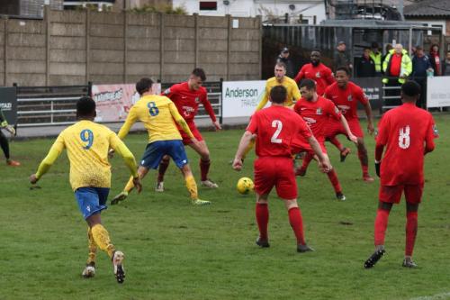 Ryan Blakes cross (9) leads to a scramble ion the Harrow box