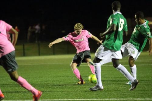 Enfields Aaron Greene shoots against the post