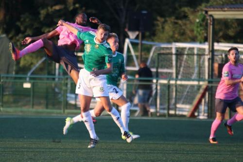 Enfields Ralston Gabriel (L) challenges Rian Bray (5) and Jake Eggleton